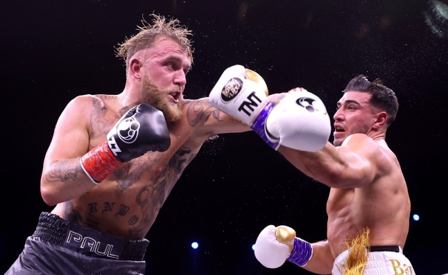 RIYADH, SAUDI ARABIA - FEBRUARY 26: Tommy Fury punches Jake Paul during the Cruiserweight Title fight between Jake Paul and Tommy Fury at the Diriyah Arena on February 26, 2023 in RIYADH, Saudi Arabia. (Photo by Francois Nel/Getty Images)