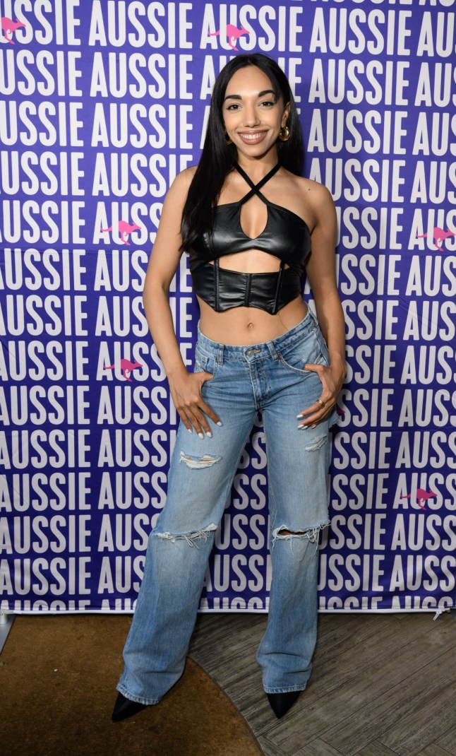 Mandatory Credit: Photo by Jonathan Hordle/Shutterstock (15364061o) Michelle Tsiakkas Aussie 'Oh My Gloss collection launch' London, UK - 18 Jun 2025 Aussie celebrated the launch of its new 'Oh My Gloss collection' by transforming Bondi Green into a beach festival