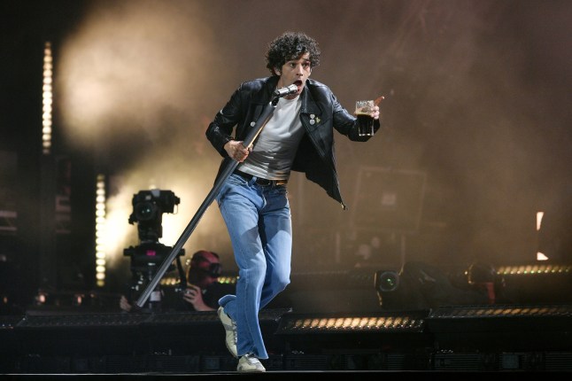 Matty Healy of The 1975 performs on the Pyramid stage during day three of Glastonbury festival 2025