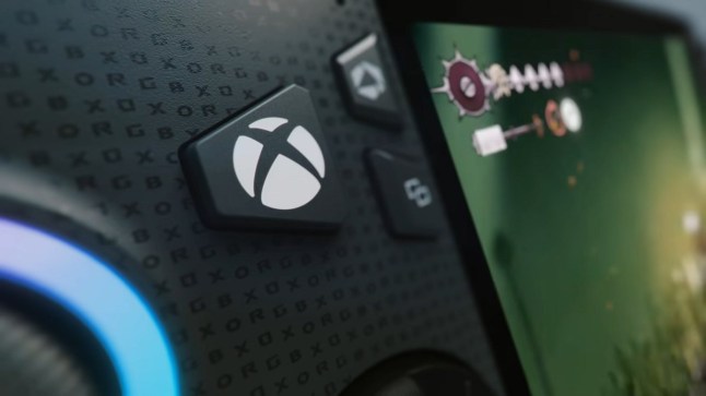 Close up of an Xbox logo button on the ROG Xbox Ally