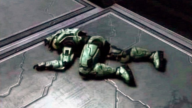 Master Chief from Halo laying defeated on the ground