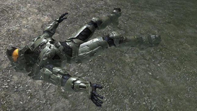 Master Chief from Halo laying defeated on the ground