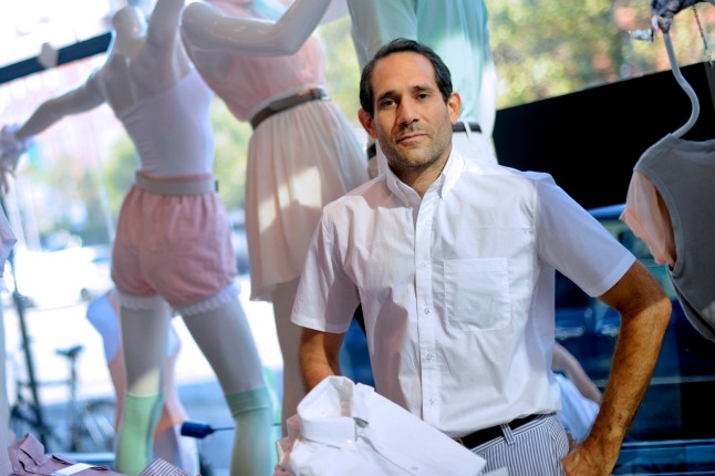 Dov Charney, chairman and chief executive officer of American Apparel Inc., stands for a portrait in a company retail store in New York, U.S., on Thursday, July 29, 2010. Starting the company in a dorm at Tufts University in Medford, Massachusetts, Charney built a worldwide empire of 280 clothing stores by leaping out ahead of mainstream fashion. He personified the racy, risk-taking aesthetics of his business and is now facing the consequences - skittish lenders and investors who doubt his ability to oversee his own creation. Photographer: Keith Bedford/Bloomberg via Getty Images