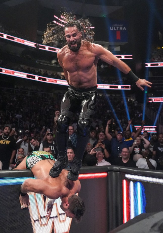 ATLANTA, GEORGIA - JULY 12: Seth Rollins stomps LA Knight during Saturday Night's Main Event at State Farm Arena on July 12, 2025 in Atlanta, Georgia. (Photo by Georgiana Dallas/WWE via Getty Images)