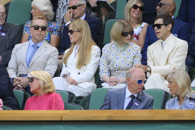 LONDON, UNITED KINGDOM - JULY 13: Sir Chris Hoy, actress Nicole Kidman and Dame Anna Wintour watch tennis from the Royal Box during day fourteen of the 2025 Wimbledon Championships at The All England Lawn Tennis and Croquet Club in Wimbledon on July 13, 2025, in London, United Kingdom. (Photo by Ray Tang/Anadolu via Getty Images)