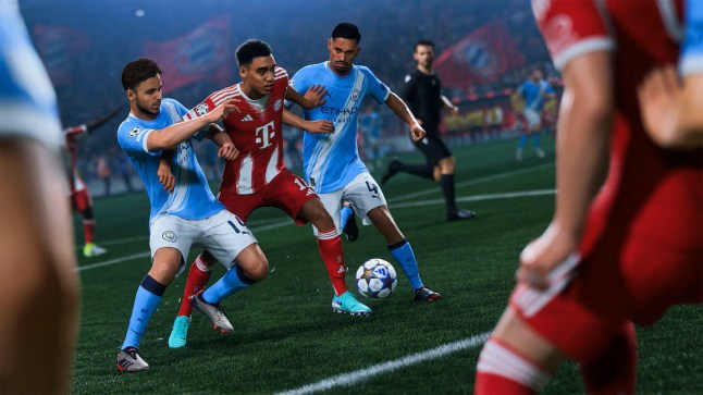 EA Sports FC 26 screenshot of two defenders holding back an attacker