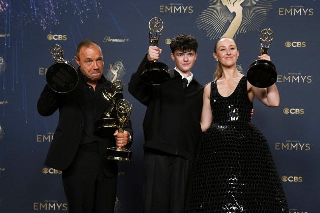 Stephen Graham, winner of the awards for outstanding lead actor in a limited or anthology series or movie, outstanding writing for a limited or anthology series or movie, and outstanding limited or anthology series, from left, Owen Cooper, winner of the award for outstanding supporting actor in a limited or anthology series or movie, and Erin Doherty, winner of the award for outstanding supporting actress in a limited or anthology series or movie for "Adolescence," pose in the press room during the 77th Primetime Emmy Awards on Sunday, Sept. 14, 2025, at the Peacock Theater in Los Angeles. (Photo by Richard Shotwell/Invision/AP)