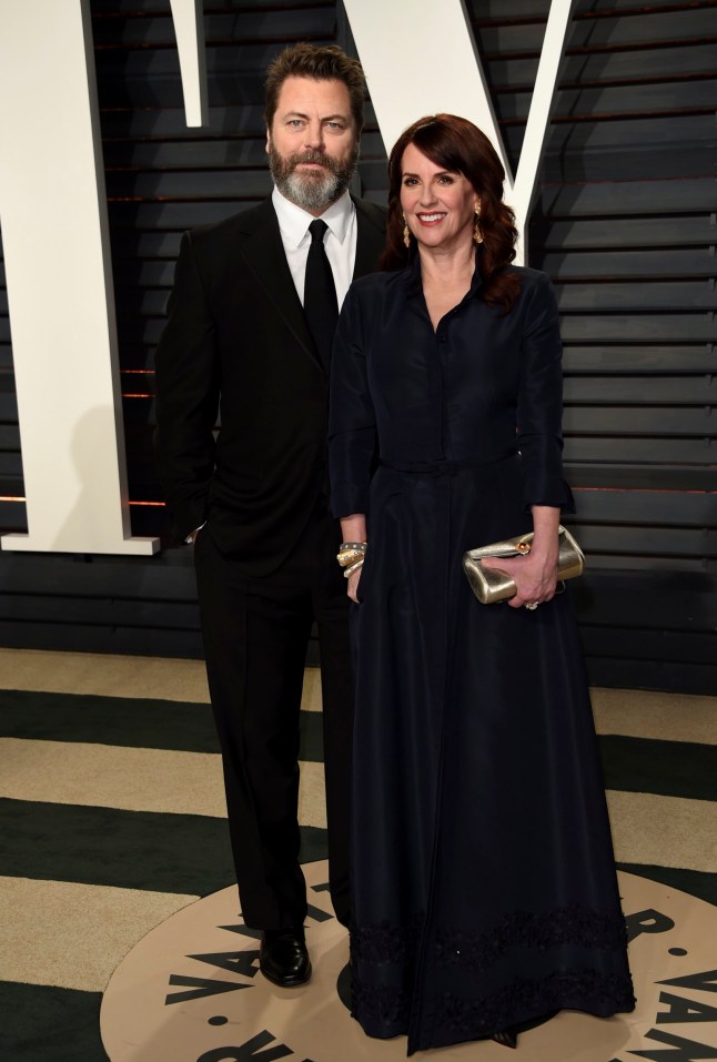 Nick Offerman, left, and Megan Mullally arrive at the Vanity Fair Oscar Party on Sunday, Feb. 26, 2017, in Beverly Hills, Calif. (Photo by Evan Agostini/Invision/AP)