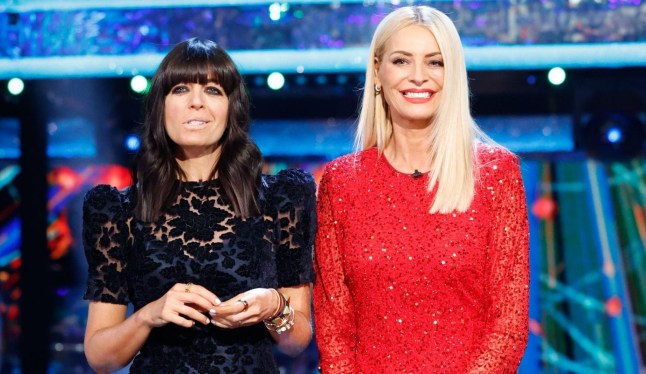 Claudia Winkleman in a black dress (left) and Tess Daly in a red dress hosting Strictly Come Dancing
