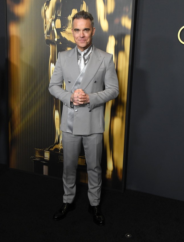 HOLLYWOOD, CALIFORNIA - NOVEMBER 17: Robbie Williams arrives at the 2024 Governors Awards at Dolby Theatre on November 17, 2024 in Hollywood, California. (Photo by Steve Granitz/FilmMagic)