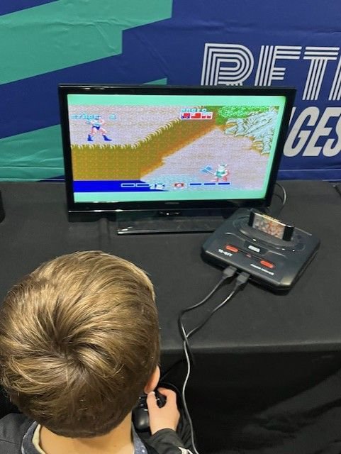 Boy playing Golden Axe at MCM London Comic Con