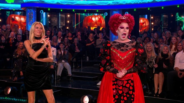 Tess Daly, wearing black dress, stood next to La Voix, dressed as Queen of Hearts on Strictly Come Dancing
