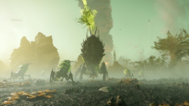 Helldivers 2 alien bugs walking across marshy wasteland