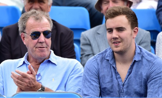 British television presenter Jeremy Clarkson (L) and son Finlo watch France's Giles Simon playing Australia's Thanasi Kokkinakis