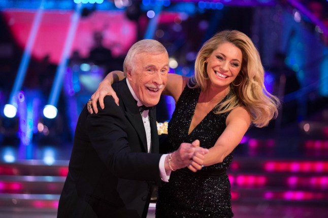 Television presenter Sir Bruce Forsyth who will be returning to Strictly Come Dancing alongside model Tess Daly for the BBC Children In Need. Undated handout photo issued by the BBC of Strictly Come Dancing Children in Need 2014 hosts Sir Bruce Forsyth and Tess Daly. PRESS ASSOCIATION Photo. Issue date date: Friday November 14, 2014. The BBC fundraising event takes place today and will be televised from 7:30pm. Photo credit should read: Guy Levy/BBC Children in Need/PA Wire. Embargoed to 0001 Friday November 14. For use in UK, Ireland or Benelux countries only. NOTE TO EDITORS: Not for use more than 21 days after issue. You may use this picture without charge only for the purpose of publicising or reporting on current BBC programming, personnel or other BBC output or activity within 21 days of issue. Any use after that time MUST be cleared through BBC Picture Publicity. Please credit the image to the BBC and any named photographer or independent programme maker, as described in the caption.