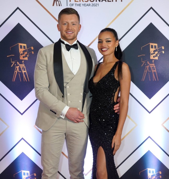Adam Peaty and partner Eirianedd Munro on the red carpet prior to the BBC Sports Personality of the Year Awards 2021 at MediaCityUK, Salford. Picture date: Sunday December 19, 2021. PA Photo. See PA story SPORT Personality. Photo credit should read: David Davies/PA Wire.
