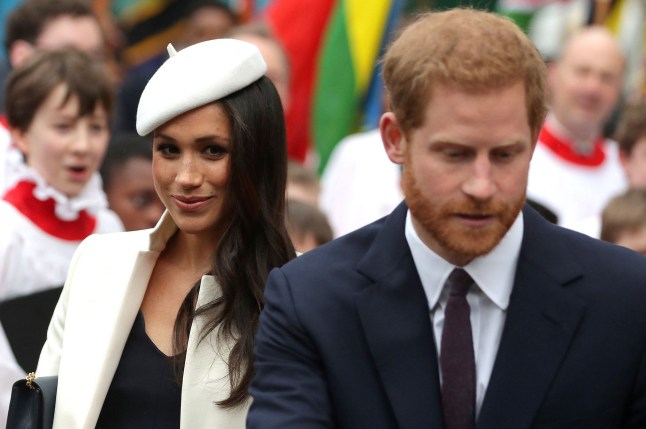 Britain's Prince Harry (R) and his fiancee, US actress Meghan Markle leave after attending a Commonwealth Day Service at Westminster Abbey in central London, on March 12, 2018. - Britain's Queen Elizabeth II has been the Head of the Commonwealth throughout her reign. Organised by the Royal Commonwealth Society, the Service is the largest annual inter-faith gathering in the United Kingdom. (Photo by Daniel LEAL / AFP) (Photo by DANIEL LEAL/AFP via Getty Images)
