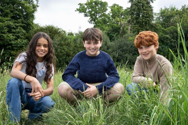 This image released by HBO shows actors, from left, Arabella Stanton, Dominic McLaughlin, and Alastair Stout, who will portray Hermione Granger, Harry Potter and Ron Weasley in the HBO series "Harry Potter." (Aidan Monaghan/HBO via AP)