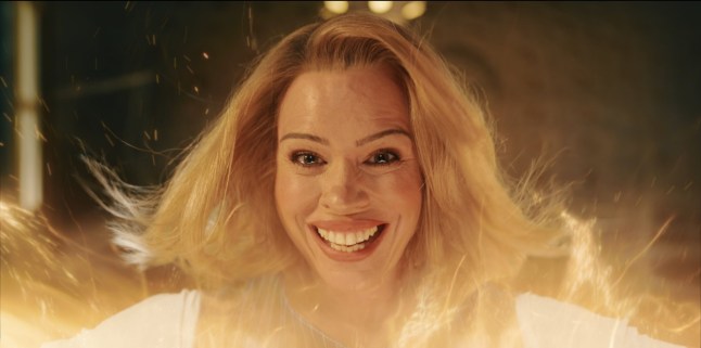 Billie Piper surrounded by regeneration energy in Doctor Who.