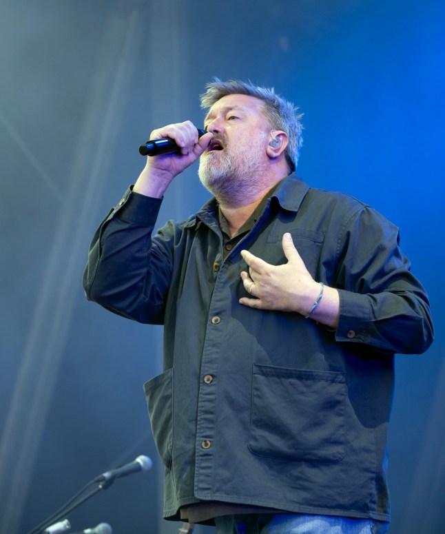 WARWICK, ENGLAND - JULY 06: Guy Garvey of Elbow performs onstage during a concert at St Nicholas Park on July 06, 2025 in Warwick, England. (Photo by Steve Thorne/Redferns)