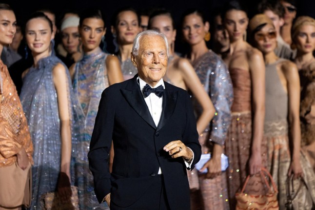 FILE PHOTO: Giorgio Armani poses with models before presenting his Spring Summer 2025 collection in New York City, U.S., October 17, 2024. REUTERS/Caitlin Ochs/File Photo