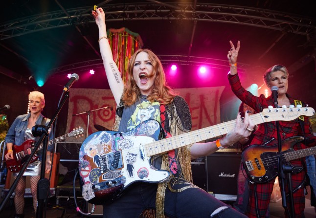 Rosalie Craig as Kitty with her guitar in Happy Valley