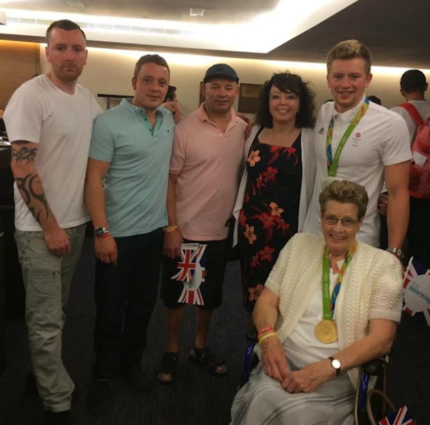 Team GB swimmer Adam Peaty with his family - parents Caroline Peaty and Mark Peaty, viral star gran Mavis Williams and brothers Richard (left) and James (second left). Collect taken from https://www.hellomagazine.com/celebrities/867340/inside-adam-peaty-family-upbringing-fallout/