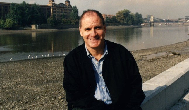 BBC Radio 5 presenter Brian Hayes sitting by the River Thames