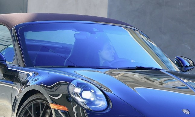 BGUK_3434615 - *PREMIUM-EXCLUSIVE* Beverly Hills, CA MUST CALL FOR PRICING BEFORE USAGE - STRICTLY NOT AVAILABLE FOR ONLINE USAGE UNTIL 19:00 PM UK TIME ON 06/12/2025 - American rapper Kanye West's wife, Bianca Censori, made a low-key stop at a Beverly Hills dermatologist, using the shorts she???d been wearing to shield her face as she stepped out in a skin-tight brown bodysuit and moon boots. The outing took a turn when a parking officer issued her a citation for stopping in a handicap spot, leaving the Yeezy architect hurrying back to her Porsche. Pictured: Bianca Censori BACKGRID UK 6 DECEMBER 2025 BYLINE MUST READ: GAMR/KHROME / BACKGRID UK: +44 208 344 2007 / uksales@backgrid.com USA: +1 310 798 9111 / usasales@backgrid.com *Pictures Containing Children Please Pixelate Face Prior To Publication*