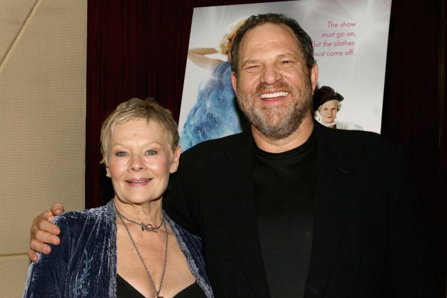 Dame Judi Dench and Harvey Weinstein smiling together at an event in 2005.