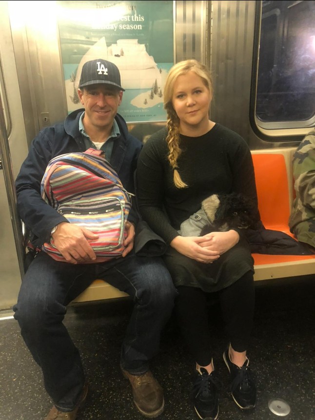 Amy Schumer posts a photo with husband Chris Fischer on the night of Dec. 12, 2025: Blah blah blah Chris and I have made the difficult decision to end our marriage after 7 years. We love each other very much and will continue to focus on raising our son. We would appreciate people respecting our privacy at this time. blah blah blah not becisse I dropped some lbs and thought I could bag s basket and not because he?s a hot Janlmes beard award winning chef who can still pull some hot tail. Amicable and all love and respect! Family forever.