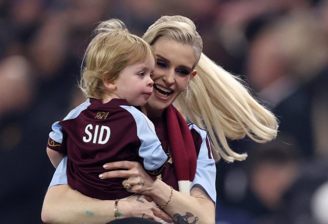 BIRMINGHAM, ENGLAND - DECEMBER 21: Kelly Osbourne, daughter of the late Ozzy Osbourne, son Sidney ahead of the Premier League match between Aston Villa and Manchester United at Villa Park on December 21, 2025 in Birmingham, England. (Photo by Catherine Ivill - AMA/Getty Images)