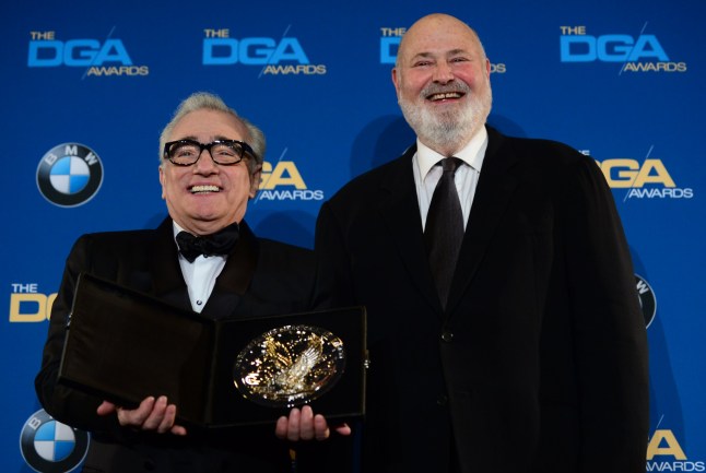 Rob Reiner flanks Martin Scorsese posing with his trophy For Outstanding Directorial Achievement in Feature Film "The Wolf Of Wall Street" in the press room at the 66th Annual Directors Guild of America Awards January 25, 2014 at the Hyatt Regency Century Plaza in Century City, California. AFP PHOTO FREDERIC J. BROWN (Photo credit should read FREDERIC J. BROWN/AFP via Getty Images)
