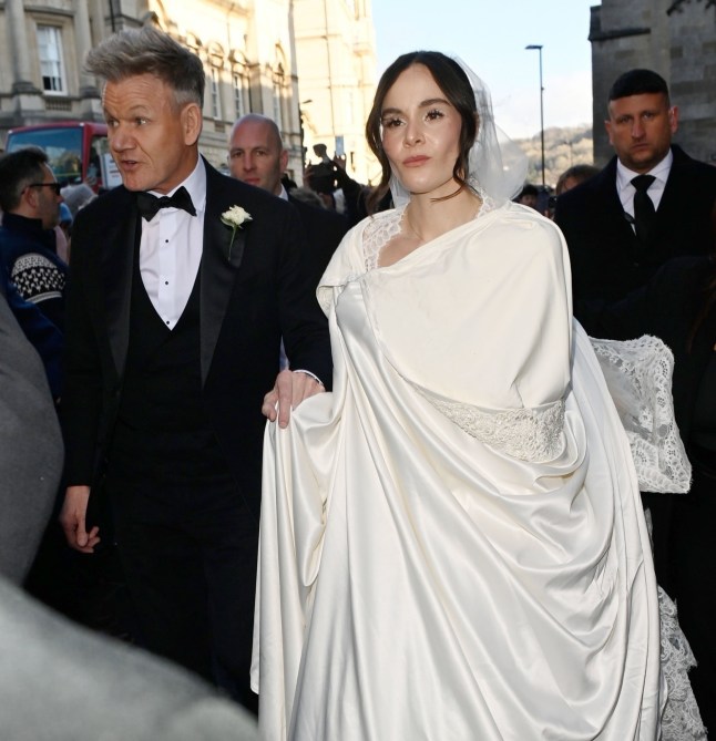 BGUK_3449100 - bath, UNITED KINGDOM Bride Holly Ramsay and her father, Chef Gordon Ramsay, are pictured arriving at Bath Abbey for her wedding to Olympian Adam Peaty. Pictured: Holly Ramsay -Gordon Ramsay BACKGRID UK 27 DECEMBER 2025 UK: +44 208 344 2007 / uksales@backgrid.com USA: +1 310 798 9111 / usasales@backgrid.com *Pictures Containing Children Please Pixelate Face Prior To Publication*