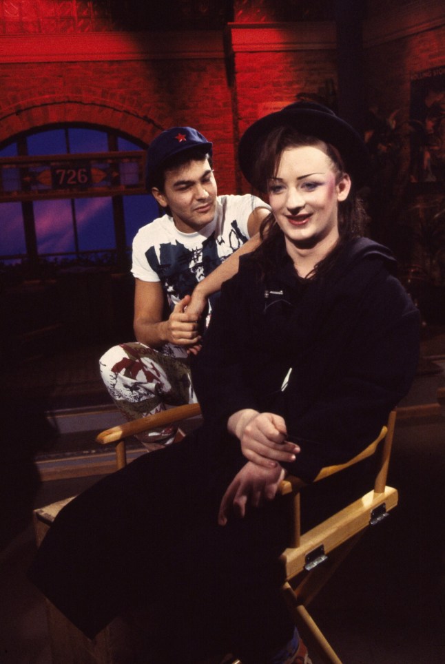 View of British Pop musicians Jon Moss (left) and Boy George (born George Alan O'Dowd), both of the group Culture Club, during an interview on MTV at Teletronic Studios, New York, New York, February 23, 1983. (Photo by Gary Gershoff/Getty Images)