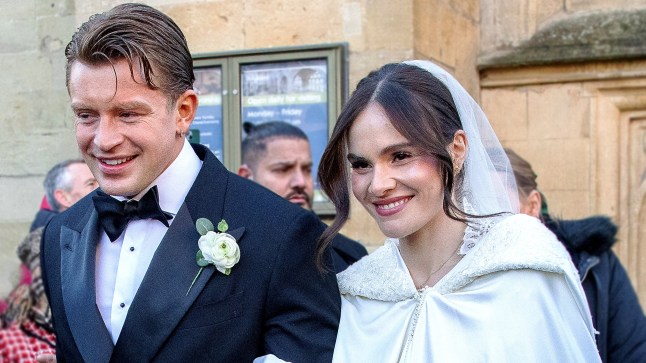 Large Crowds gather to see Olympic Swimmer Adam Peaty and Holly Ramsey leave Bath Abbey after their wedding. Holly is the daughter of celebrity chef Gordon Ramsey and guests at the wedding included Sir David and Lady Victoria Beckham joined by three of their four children: Romeo,Cruz and Harper Pictured: adam peaty,holly ramsey Ref: BLU_S9277030 271225 NON-EXCLUSIVE Picture by: David Betteridge Splash News / SplashNews.com Splash News and Pictures USA: 310-525-5808 UK: 020 8126 1009 eamteam@shutterstock.com World Rights